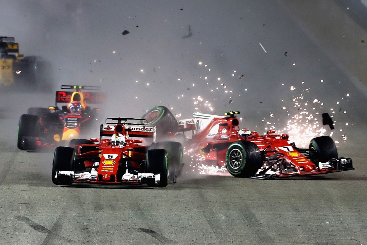 Sebastian Vettel and Kimi Raikkonen collide at the start during the Formula One Grand Prix of Singapore.