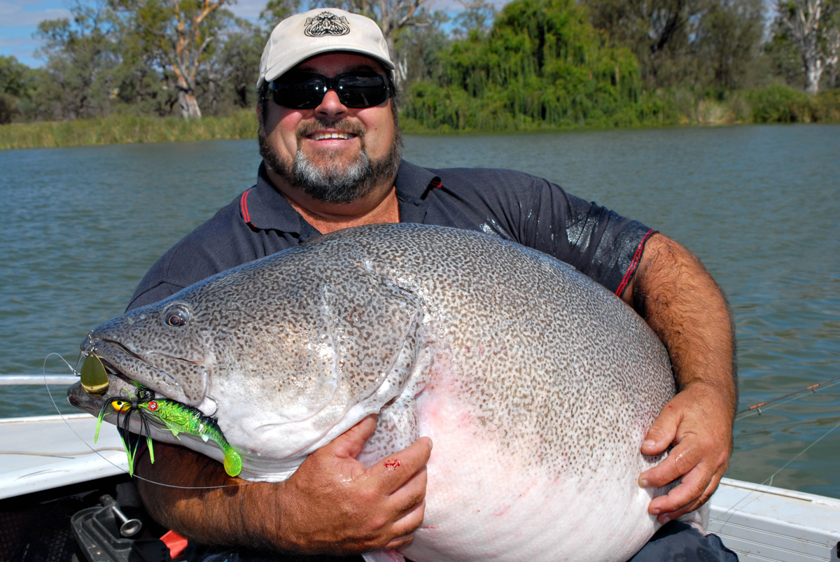 Gus Storer holds a huge cod