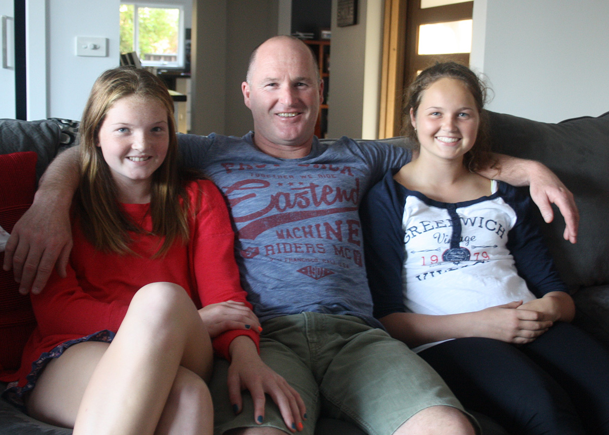 Anthony Banik and his daughters, Georgie and Jess.