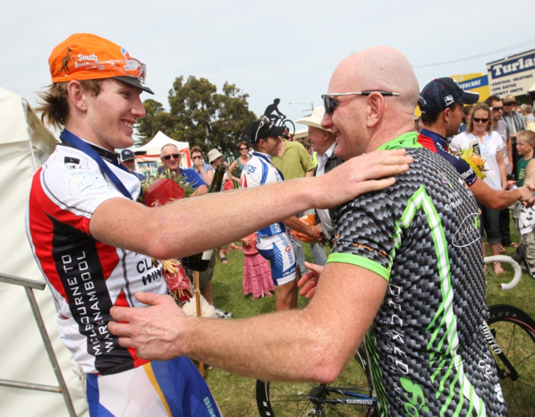 Zak Dempster celebrates with his father Darren, the D Grade winner. (Courtesy The Standard).