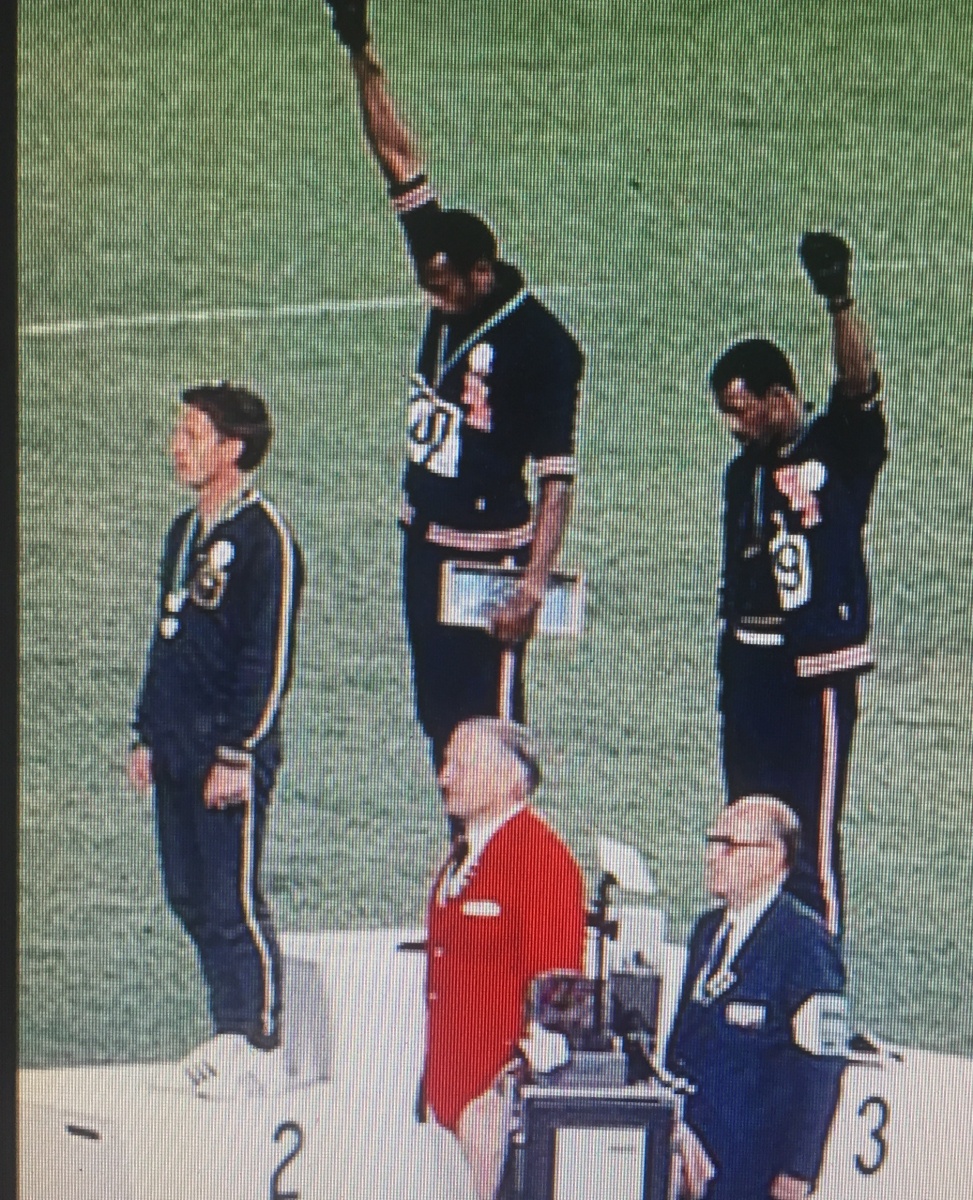Peter Norman on the protest dais 