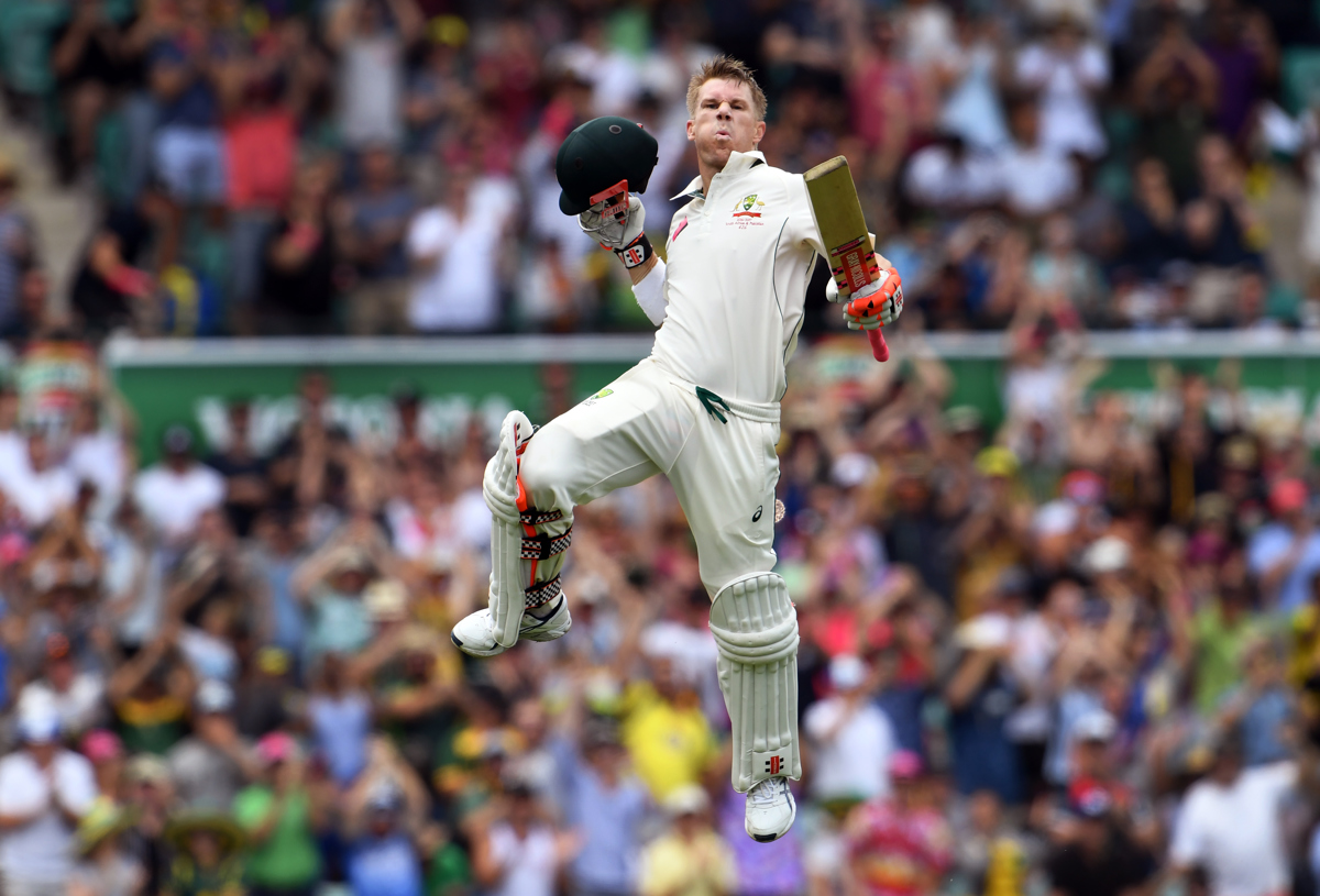 David Warner celebrates scoring a century Pic: WILLIAM WEST/AFP/Getty Images