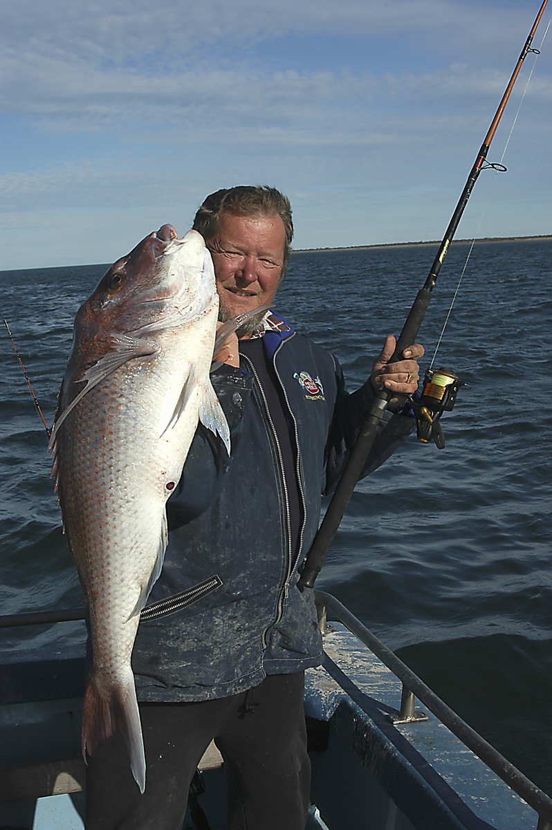 Steve Cooper shows off a big snapper, a size that most anglers strive for.