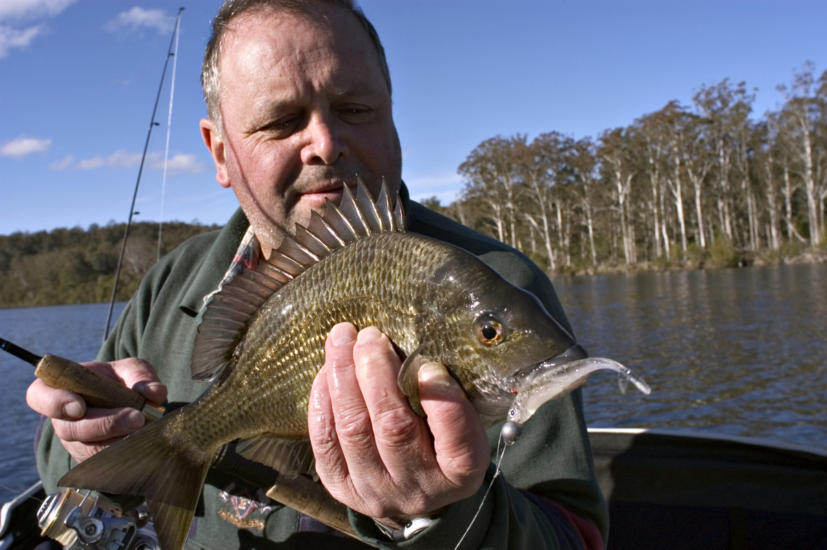 Andy Zarro with a bream caught in the Wallagaraugh River in NSW.