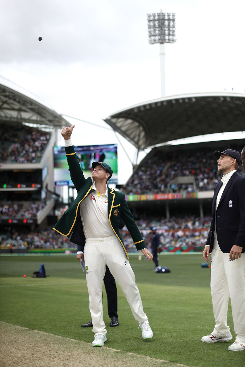 Steve Smith tosses the coin as Joe Root looks on. Pic: Ryan Pierse/Getty Images