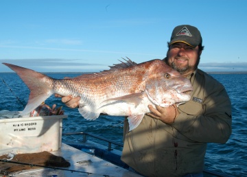 Gus Storer with a 13kg snapper caught off Whyalla using yellowtail kingfish throats as bait. Among other food found inside snapper was a wallaby skull.