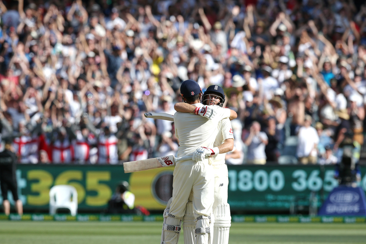 Alastair Cook hugs joe root after scoring his century.