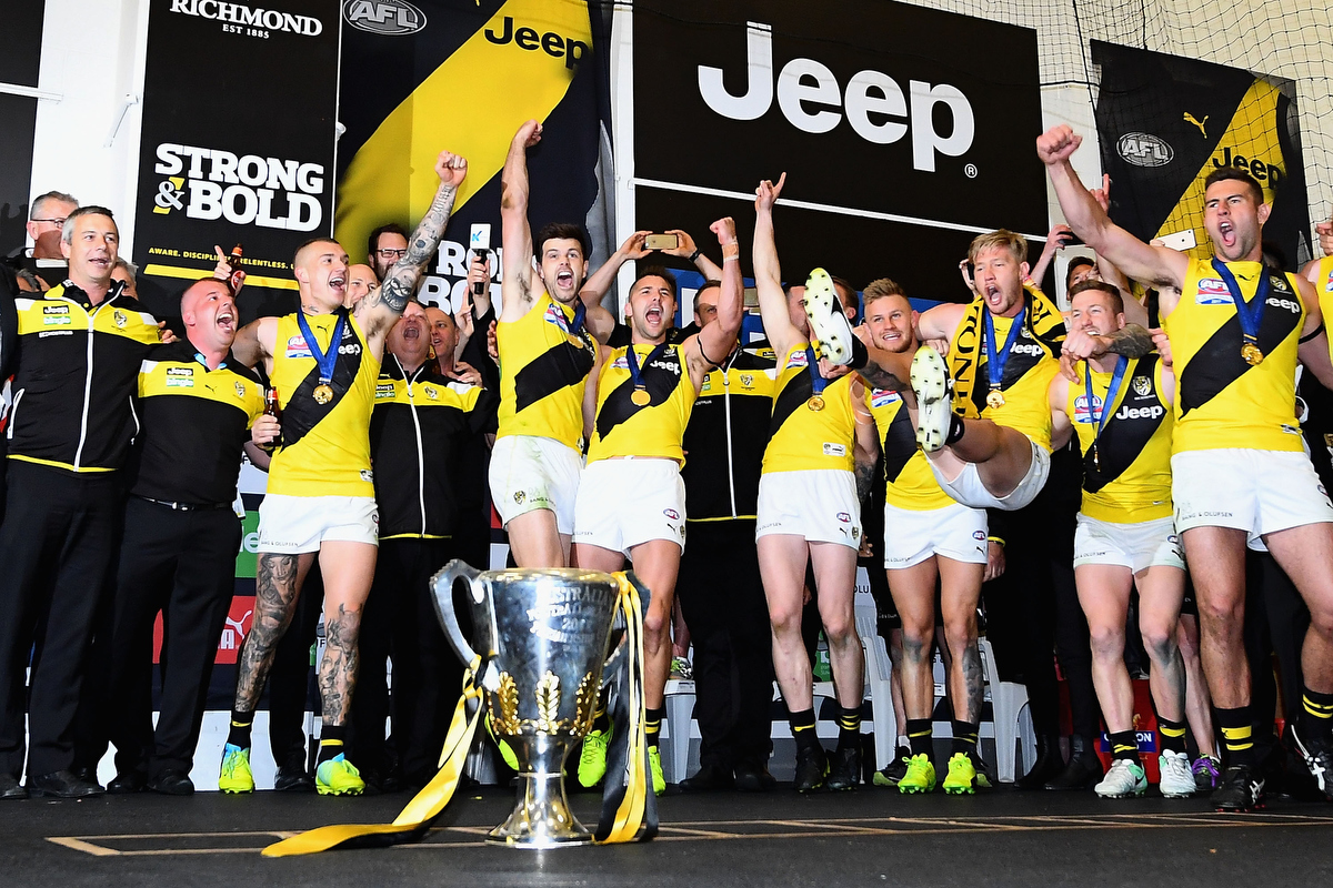 The Tigers belt out the theme song after the Grand final. Pic: Quinn Rooney/Getty Images