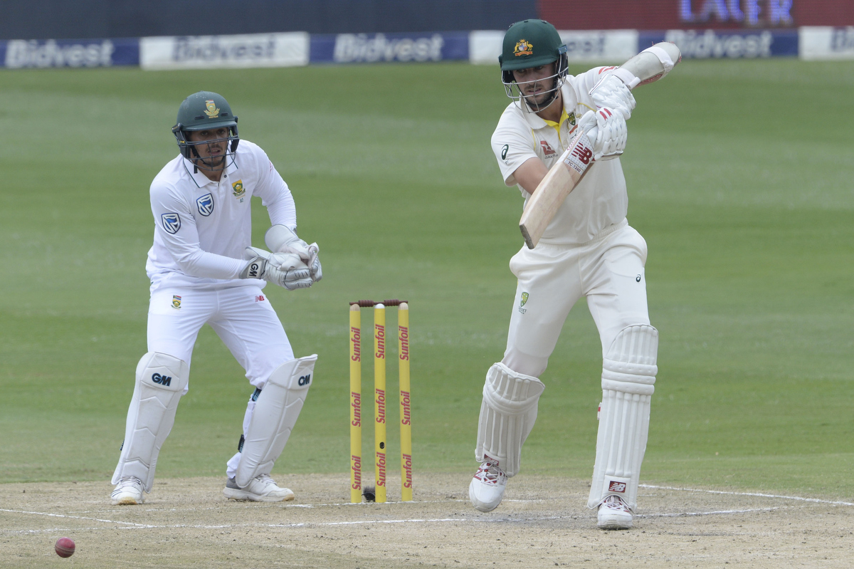 Pat Cummins on his way to his half century. Pic: Lee Warren/Gallo Images/Getty Images)