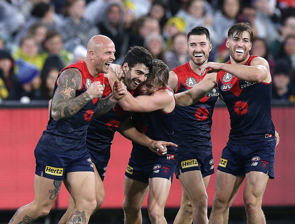 Melbourne players celebrate