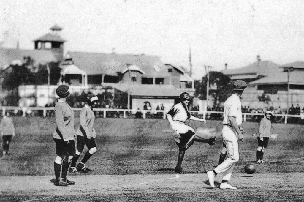 A celebrity guest kicks off a women’s soccer game in Brisbane 1921, most probably the historic Brisbane Cricket Ground match of September 24 Credit: Lee McGowan, Sport in History